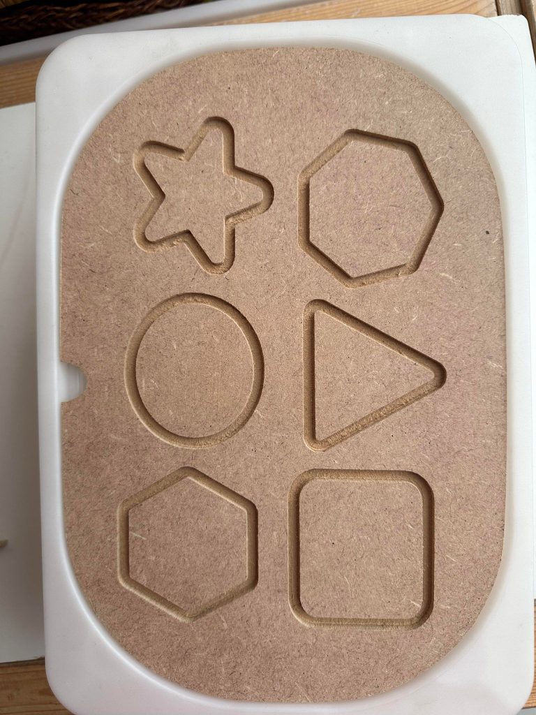 IKEA Flisat Carved Shapes lid ideal for pre writing activities to strengthen hand muscles for writing