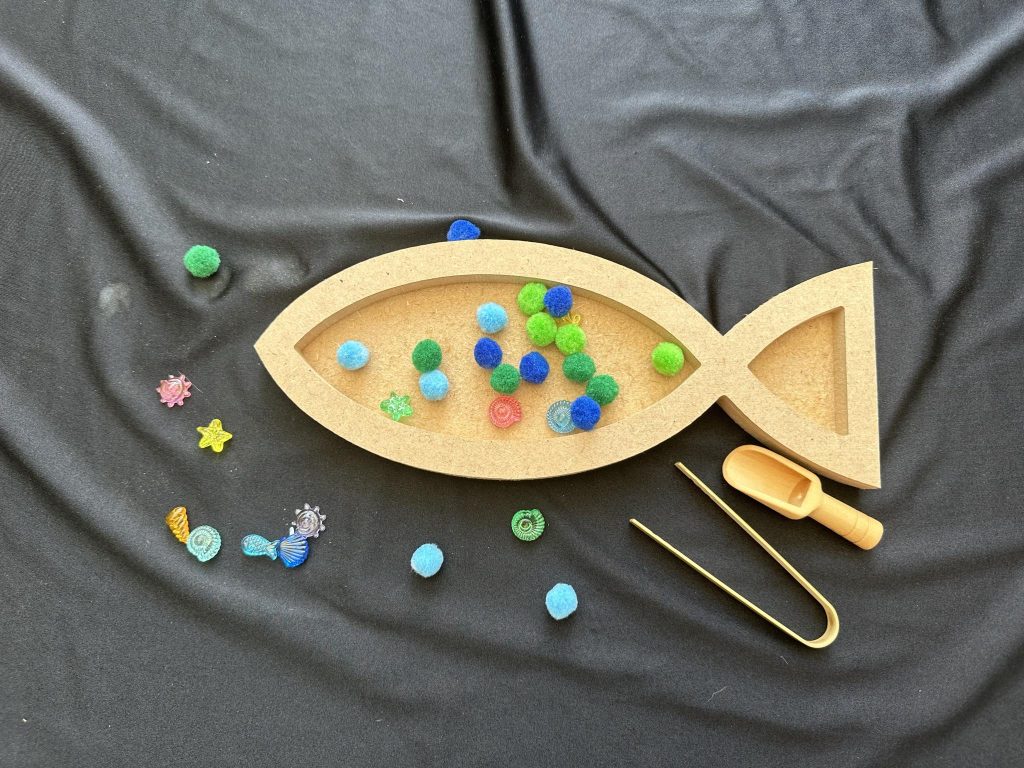 Fish tray great sensory rice, or chick pea play