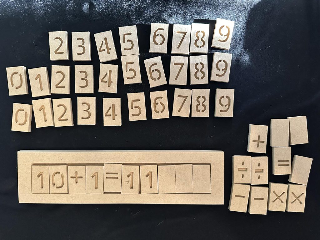 Maths tray complete with numbers, blanks and maths symbols