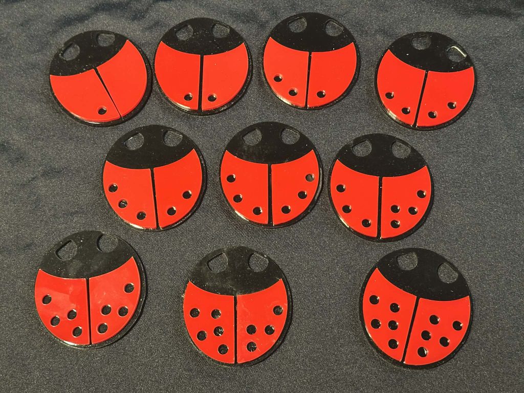 Acrylic Ladybird Numbers - Bright and engaging ladybird number pieces, perfect for adding a fun, hands-on element to early maths activities.