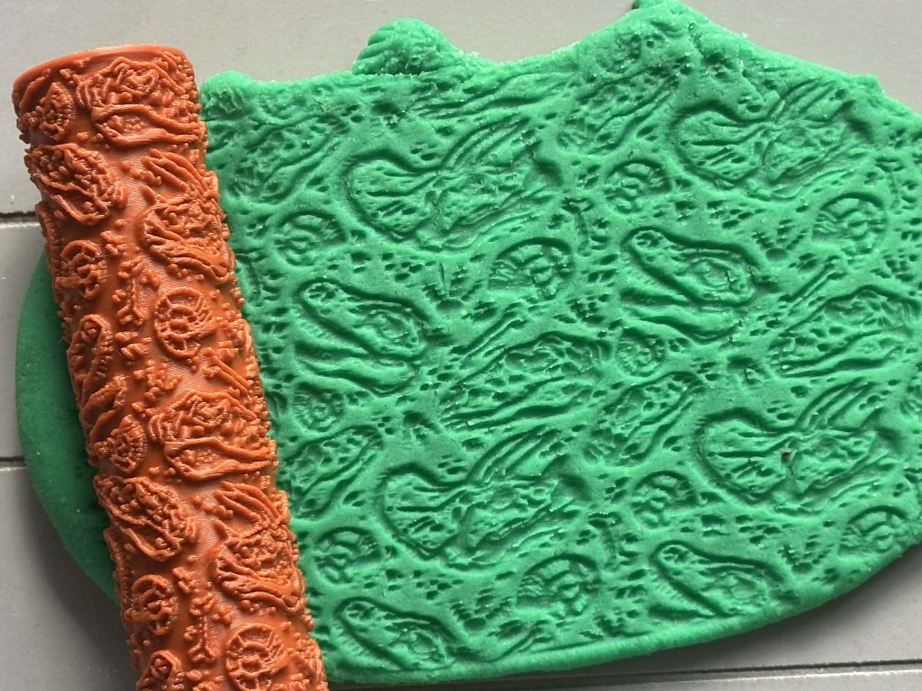 3D Printed Dinosaur Roller - Great for play dough, damp sand or clay, these rollers create beautiful seasonal patterns and support hands-on, creative play
