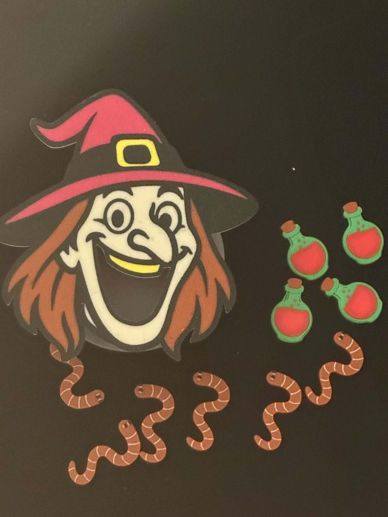 Witch Feeding Face - great fine motor skills Halloween activity
