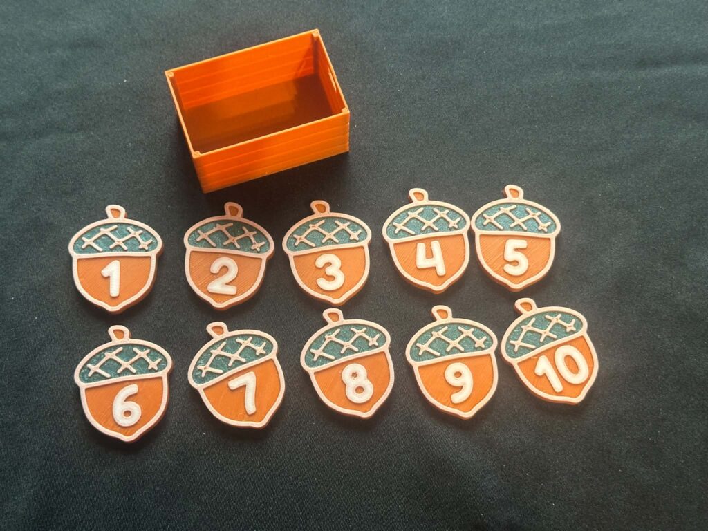 3D Printed Acorn Numbers 1 to 10 in a mini crate - Great for Sensory play