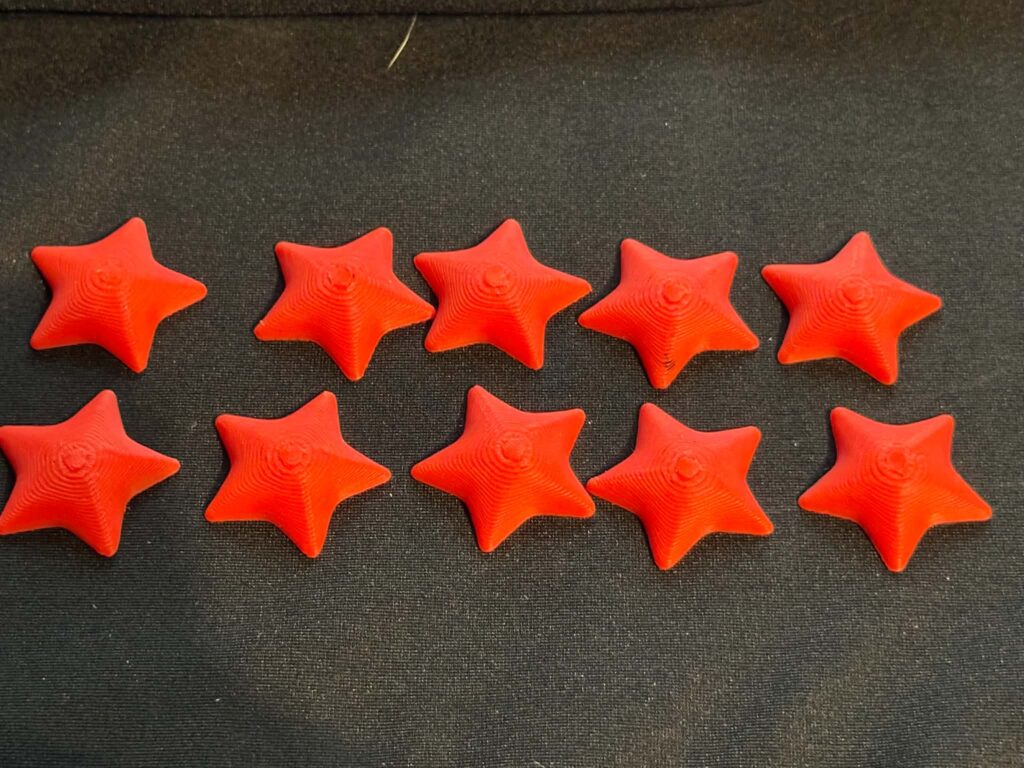 3D printed Star Tokens - great for sensory play or counting