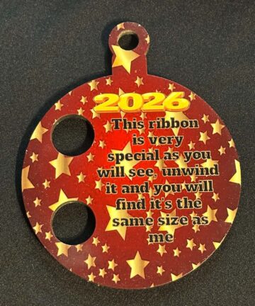 Christmas Ribbon Bauble – Measure Your Little One With Some Ribbon And Then Tie Through The Holes To See How Much They Grow Each Year